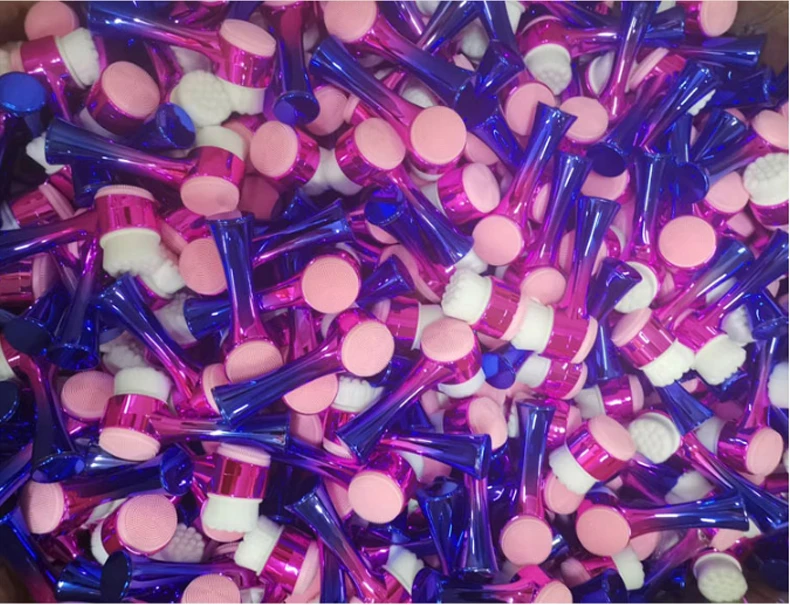 Electroplated face cleaning brush